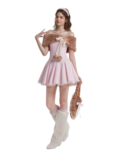 Woman in a pink dress with a deer print shawl and boots on a white background