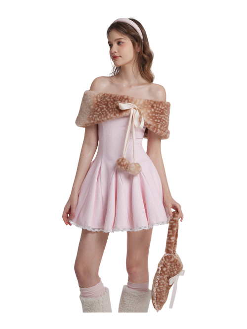 Woman wearing a pink dress with fur accents on a white background