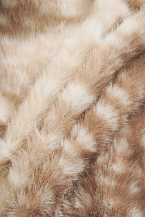 Close-up of brown and beige fur texture
