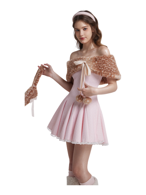 Woman wearing a pink dress with a shawl on a white background